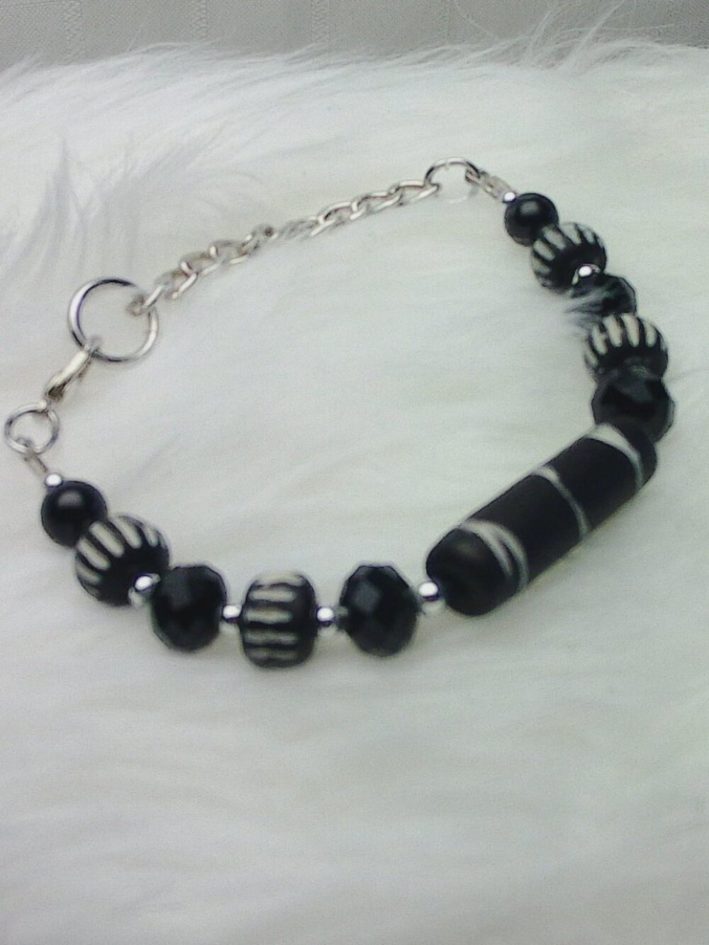 Beautiful handmade bracelet with engraved elk bone beads, crystals & beads